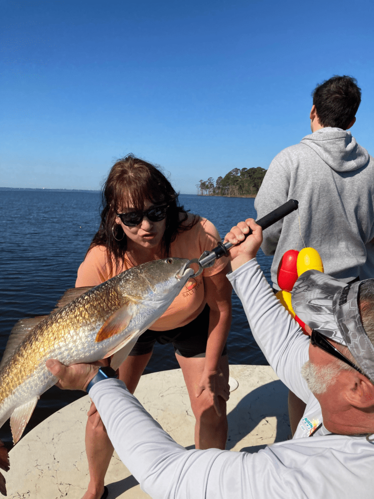 Angler with trophy redfish